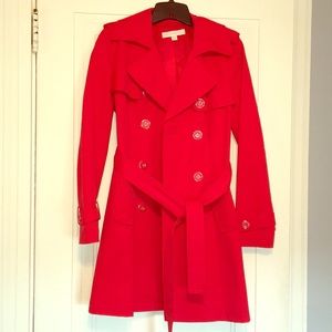 Red belted rain coat